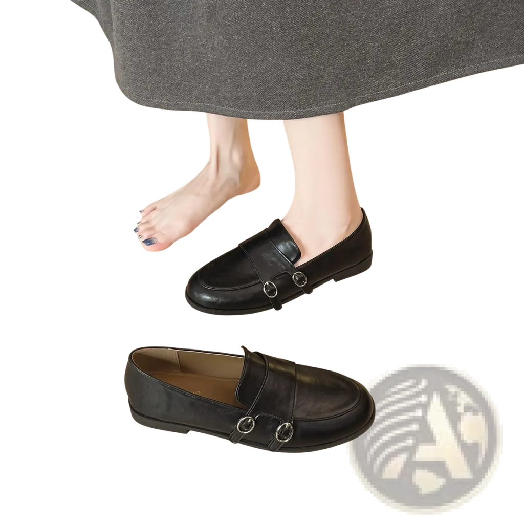 Black leather loafers with double buckle detailing showcasing a retro style and premium craftsmanship