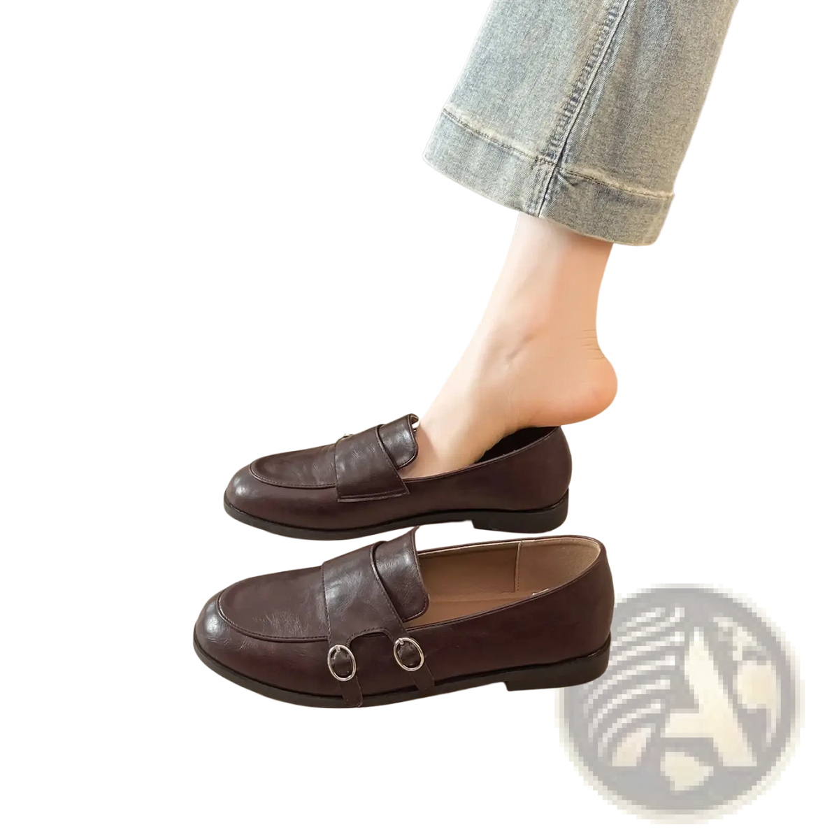 Black leather double buckle retro loafers with sleek minimalist design and two silver toned metal buckles on front