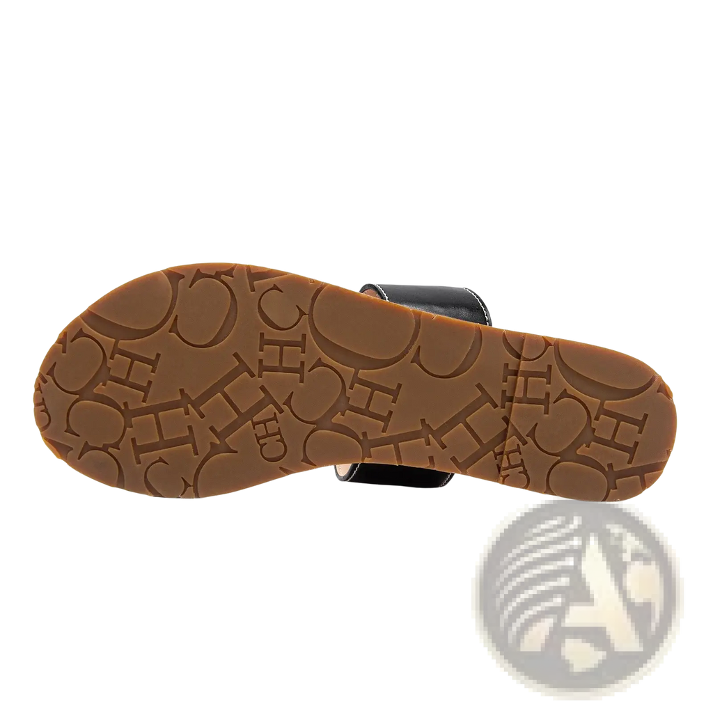 Black leather flat sandal with brown rubber sole embossed with a repeating ch logo pattern