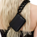 Black leather mini waist bag with chunky chain strap showcasing its sleek leather material and bold chain detail