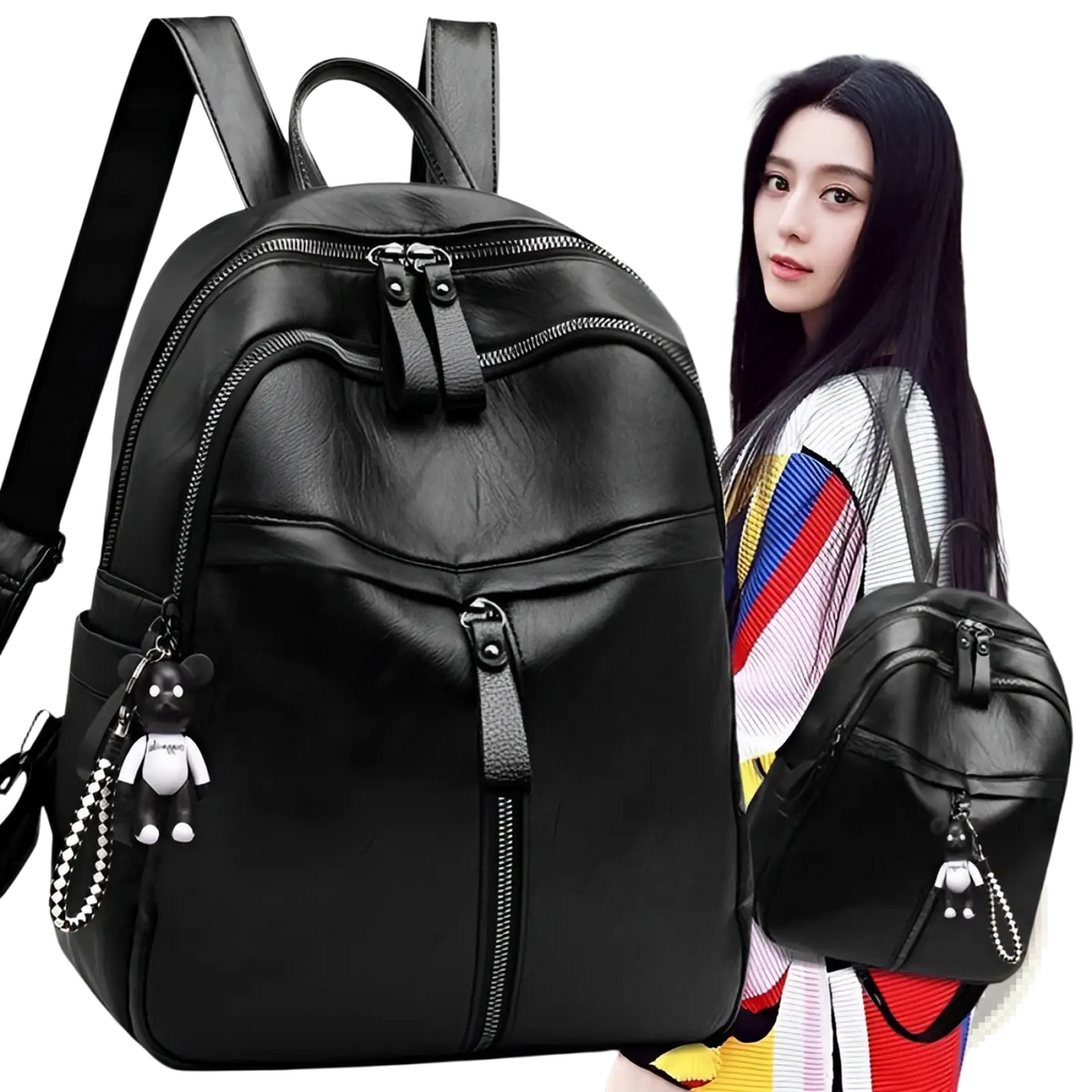 Black leather school backpack with zippers and a cartoon bear charm for versatile daily use