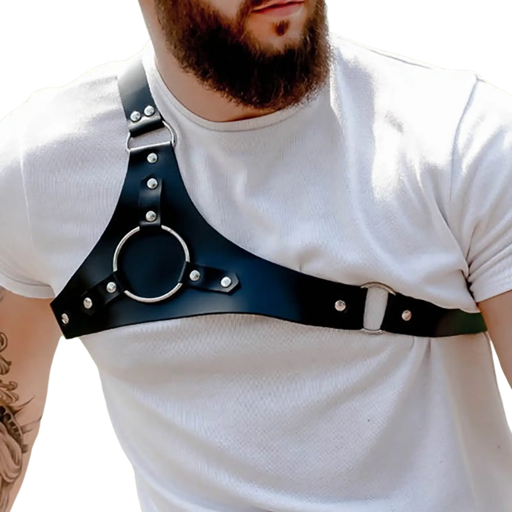 Black leather studded dance harness with silver buckles and central circular ring made of metal hardware