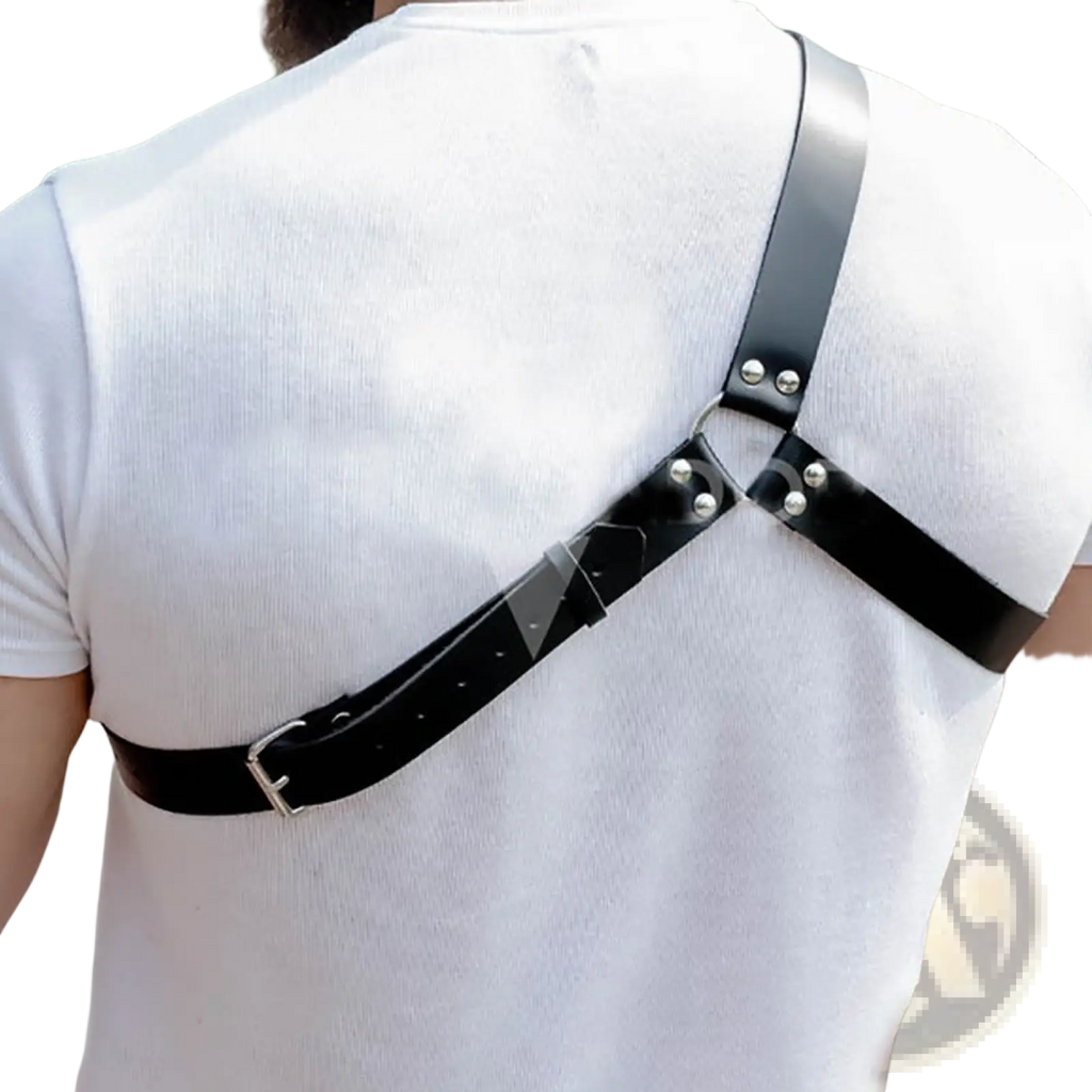 Black leather studded dance harness featuring silver-toned metal buckles and studs in front view
