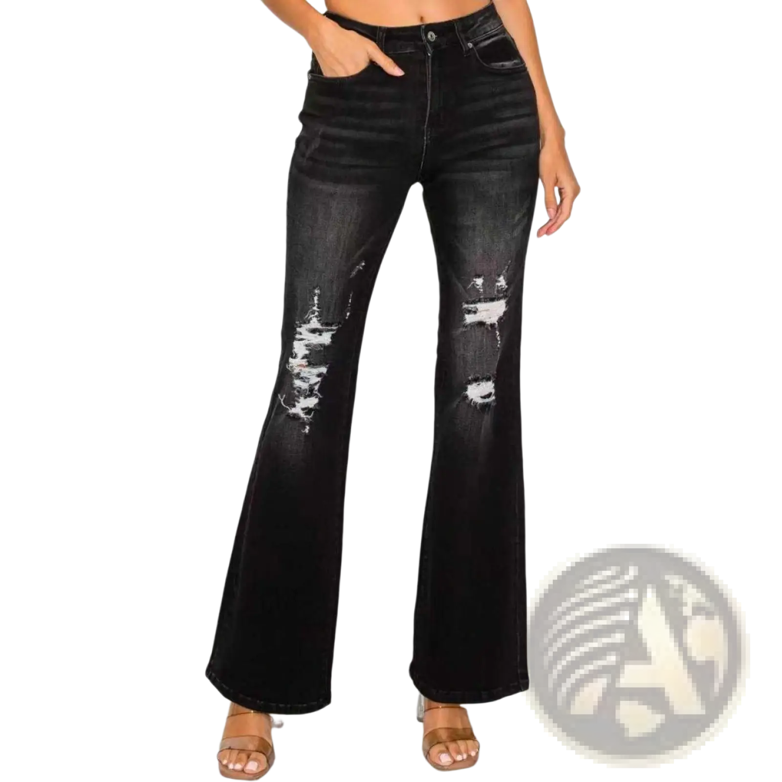 Black low rise distressed flared denim jeans with ripped knee details and a worn black finish