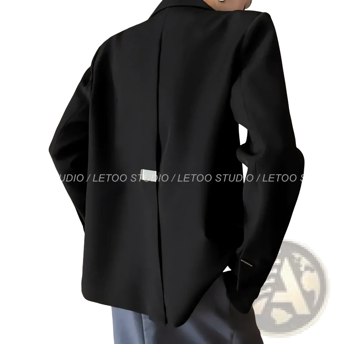 Black minimalist women blazer in sleek modern design with subtle back seam detail shown from the back side
