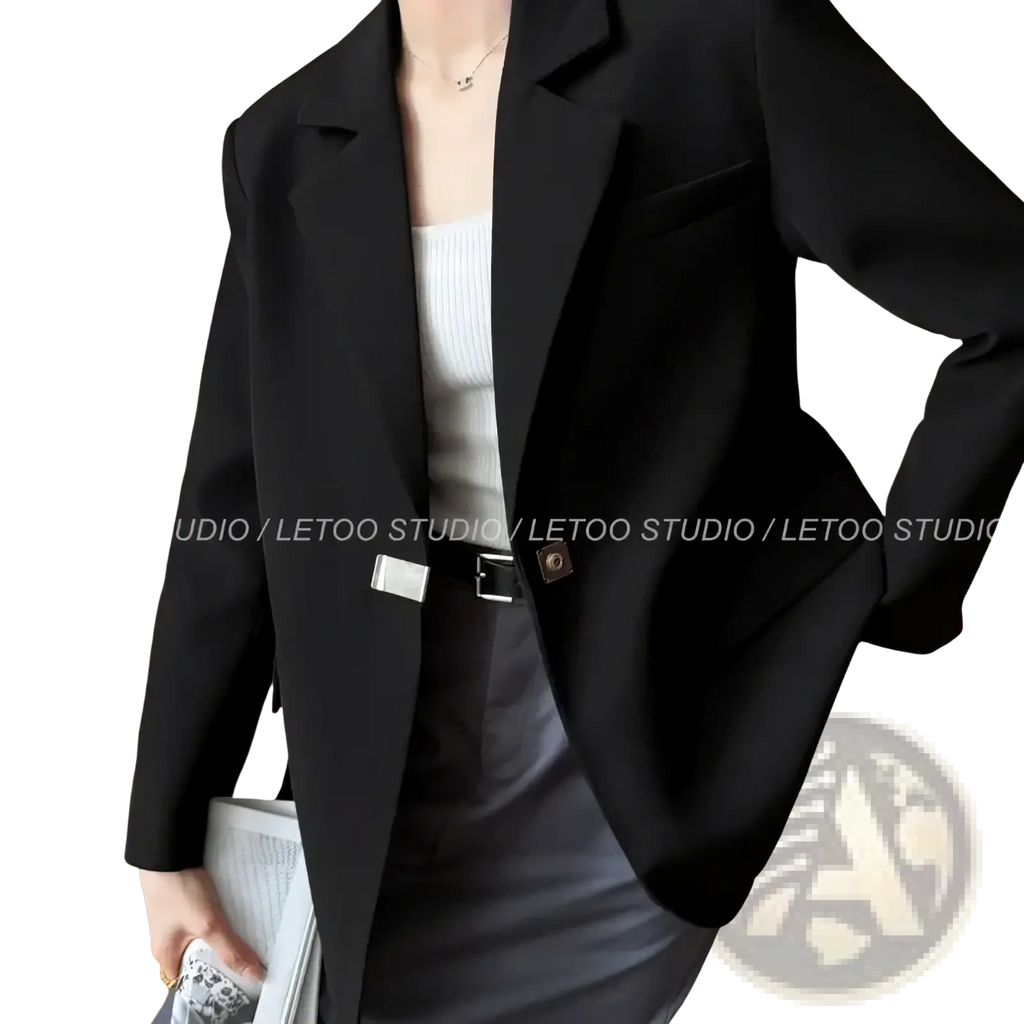 Black minimalist women blazer in sleek tailored fit with structured lapels for a polished professional look