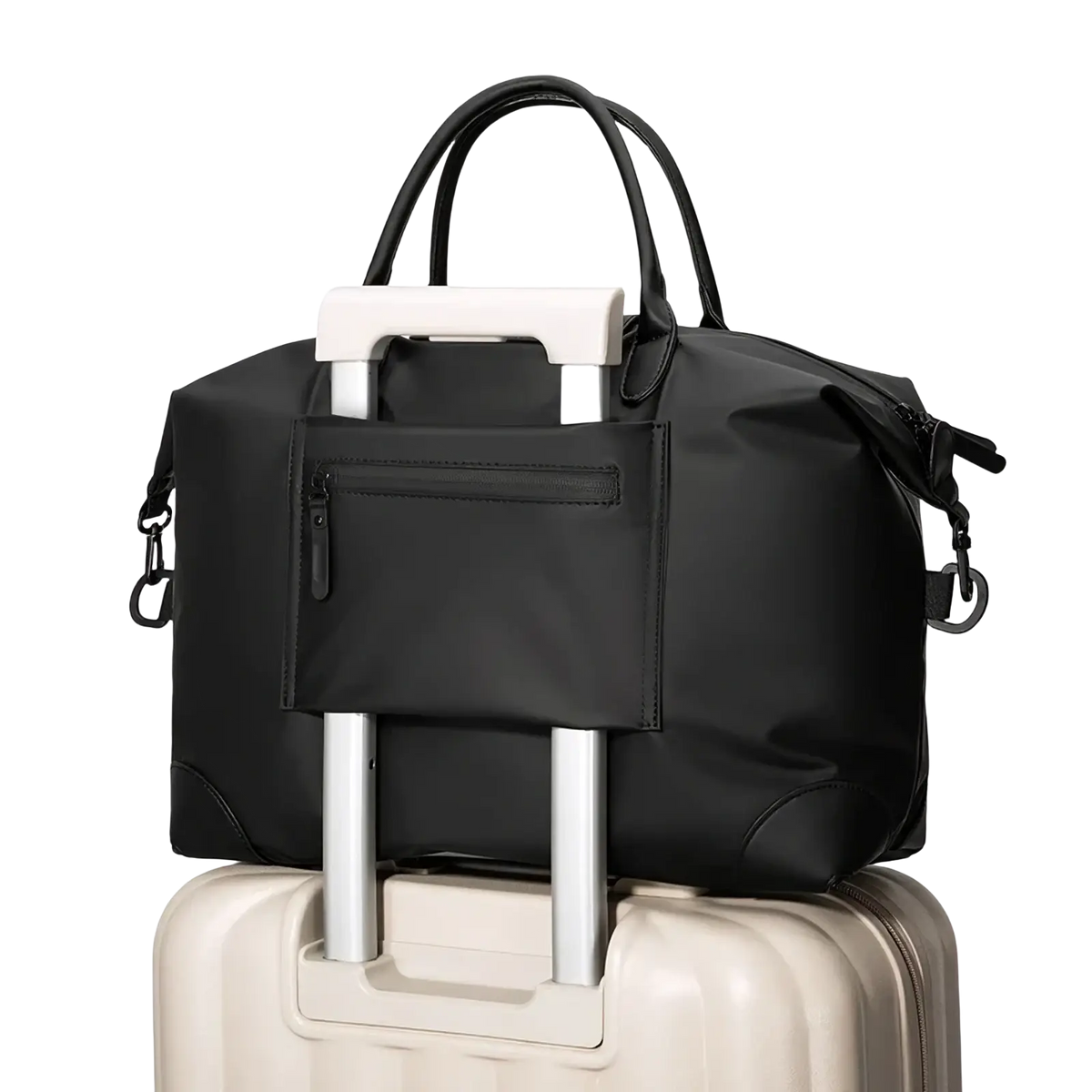 Black nylon travel duffle bag with top handles and front zippered pocket designed to attach securely over suitcase wheels