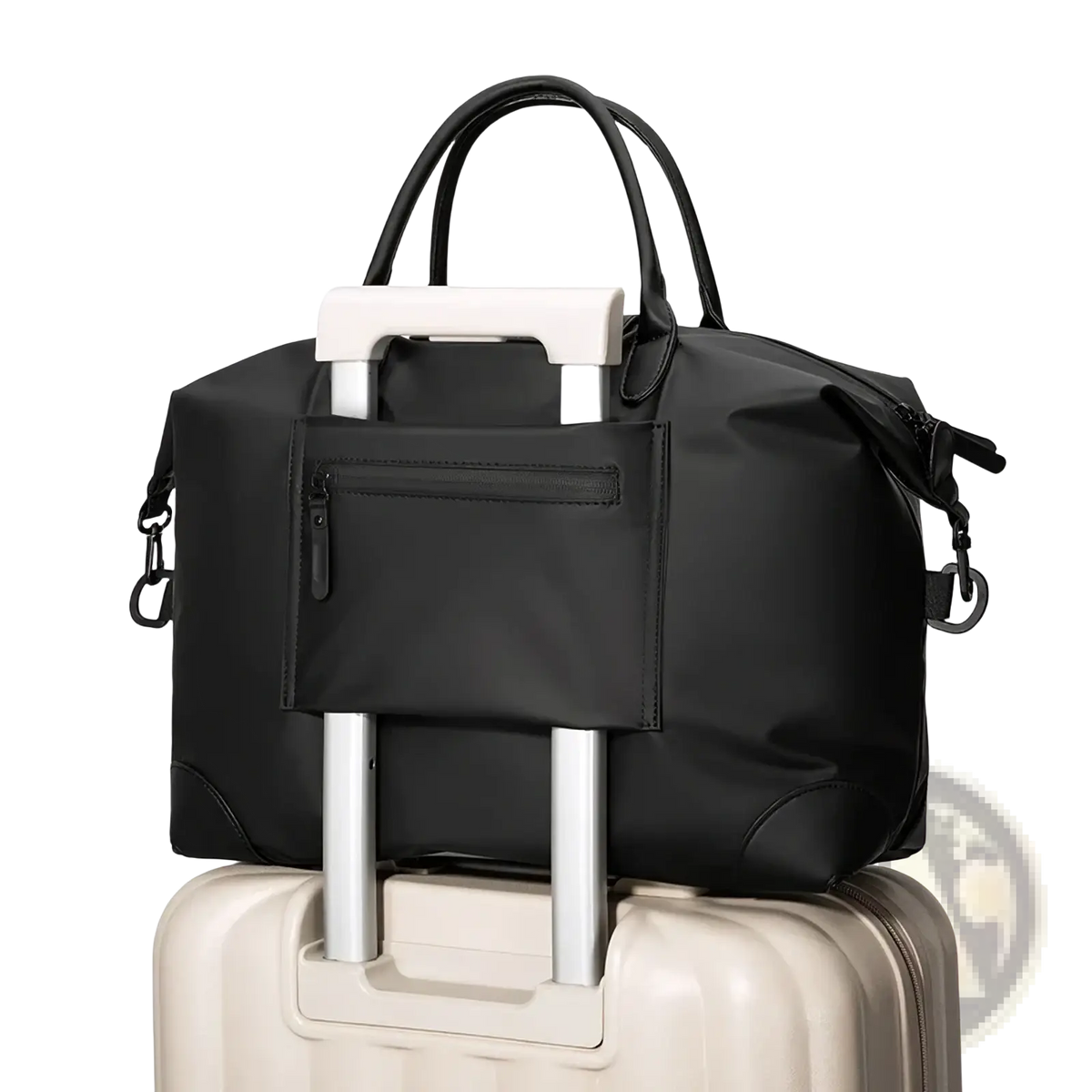 Black nylon travel duffle bag with top handles and front zippered pocket designed to attach securely over suitcase wheels