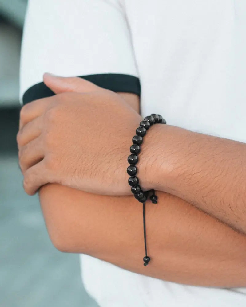 Aaa grade Bali black obsidian beaded bracelet featuring a sleek and simple design in black beads