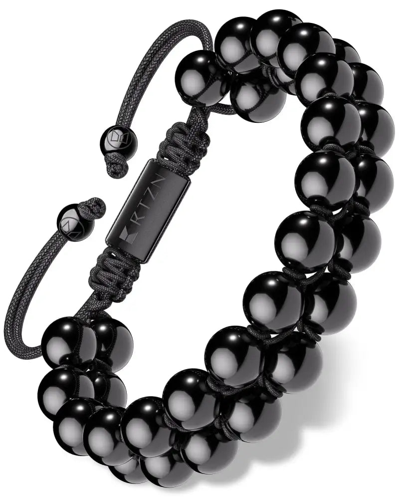 Morocco black obsidian beaded bracelet with black braided adjustable cord and rectangular metal clasp