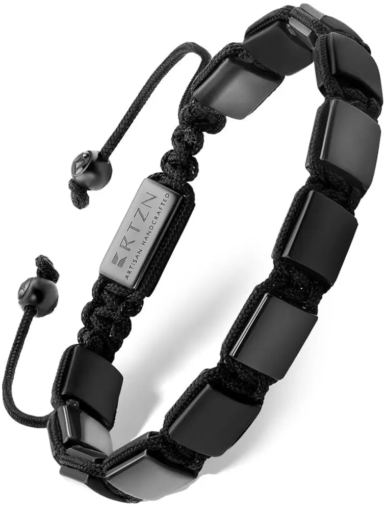 Havana black onyx and hematite beaded bracelet with black rectangular hematite beads on black braided cord and silver tag
