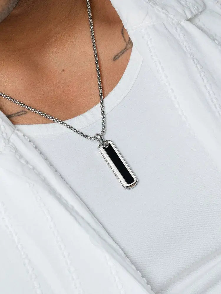 Silver chain necklace with black onyx rectangular pendant featuring textured edges in 316l stainless steel
