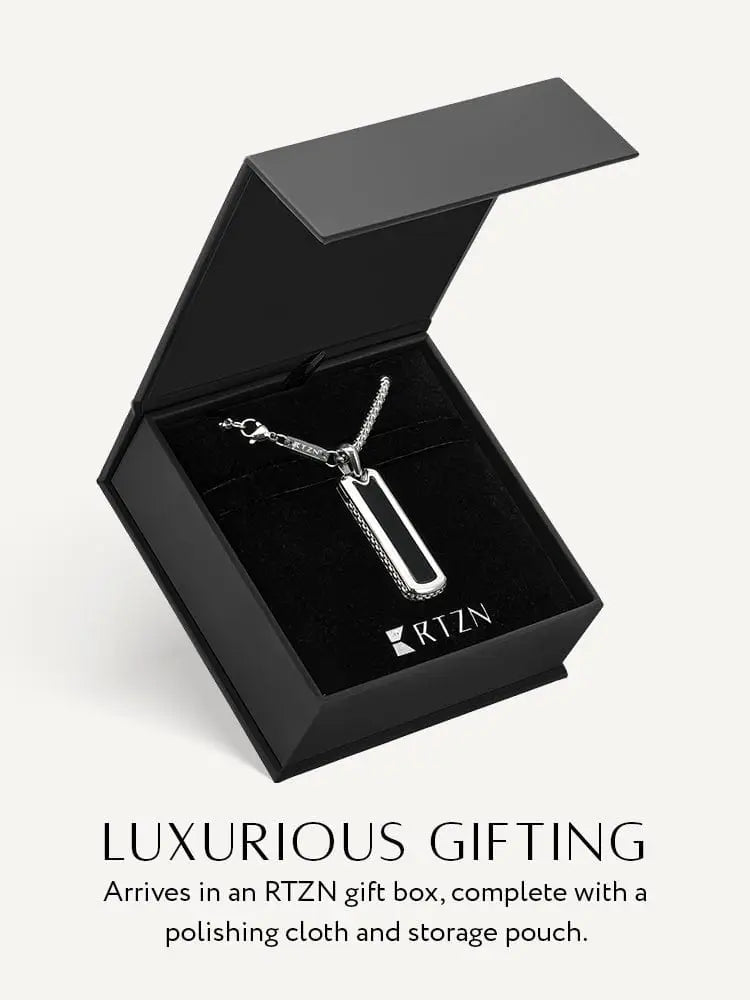 Silver-toned rectangular pendant necklace with black onyx inlay in 316l stainless steel featuring a sleek modern design