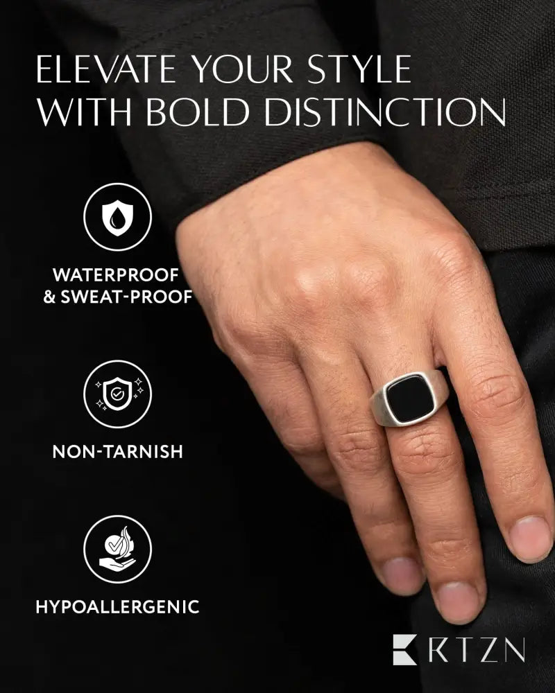 A sleek silver 316l stainless steel black onyx cushion signet ring with a square black inlay for bold distinction
