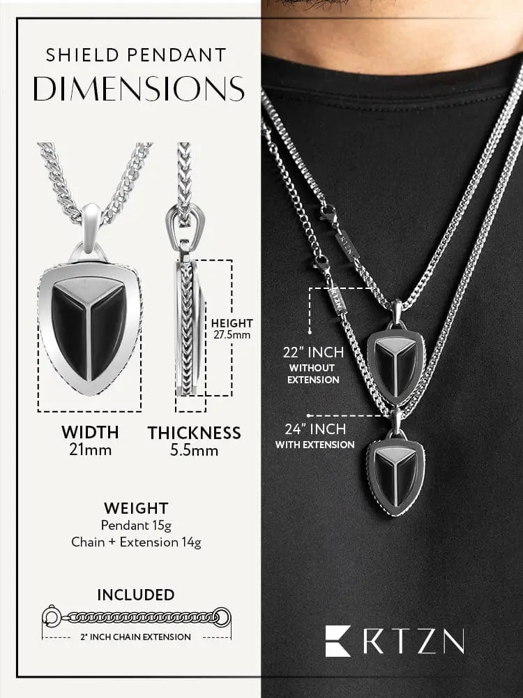 Silver shield-shaped black onyx pendant with three-pronged design and textured 316l stainless steel chain