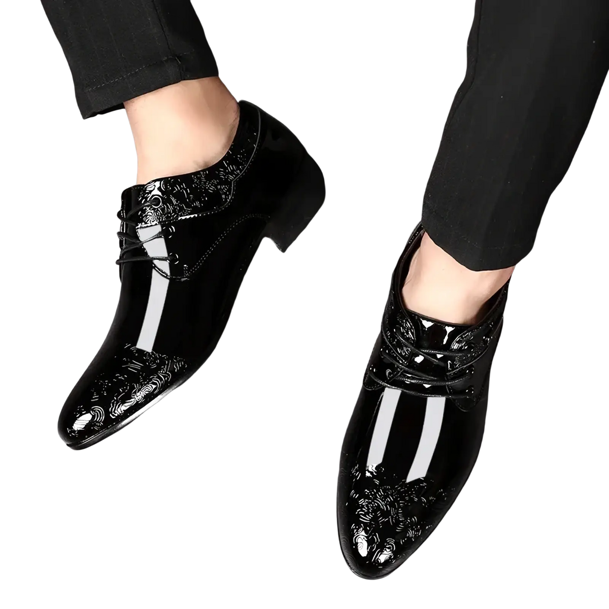 Black patent leather brogue oxford shoes with glossy finish and intricate white floral embroidery on the toe cap