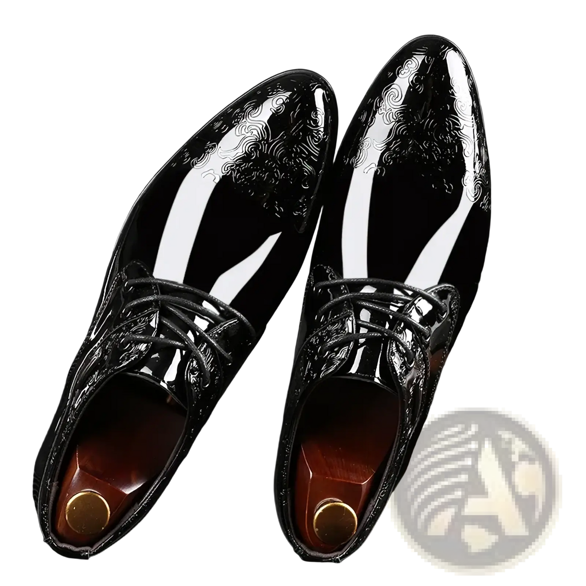 Black patent leather brogue Oxford shoes with glossy finish and intricate white swirl patterns on the toe cap