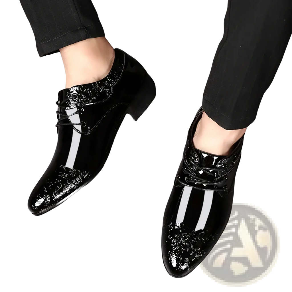 Black patent leather brogue oxford shoes with glossy finish and intricate white floral embroidery on the toe cap