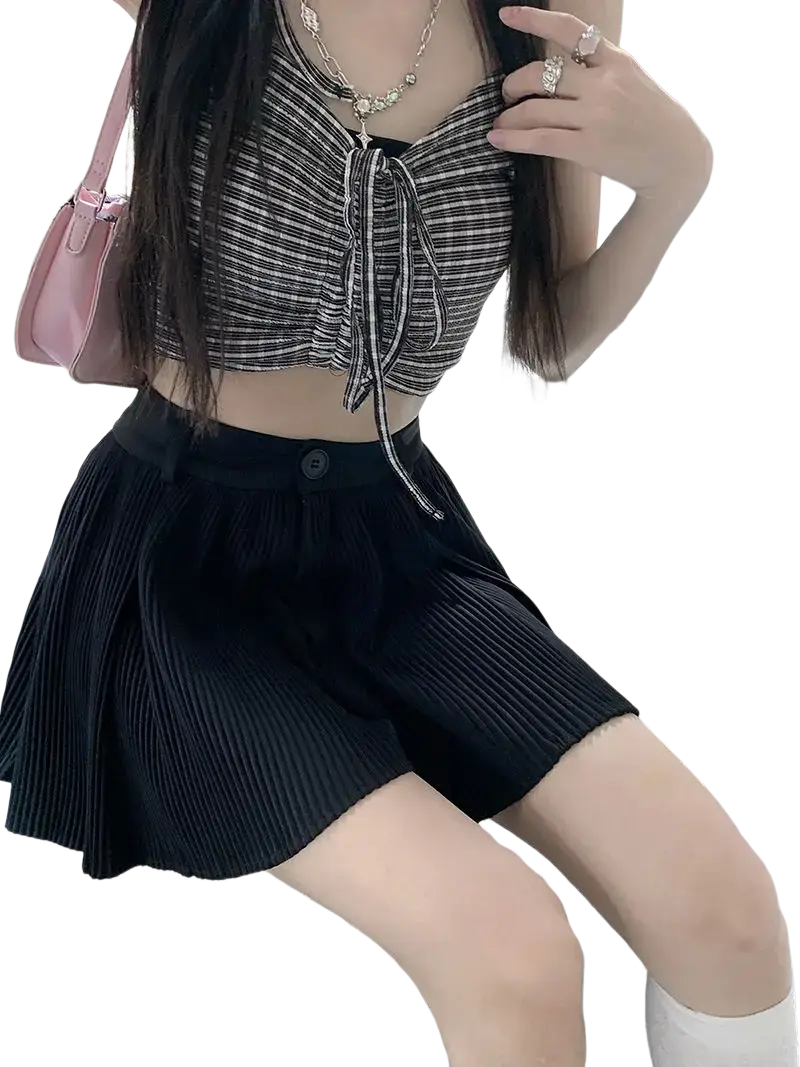 Black pleated high waist summer shorts with button closure and subtle textured fabric for warm weather wear