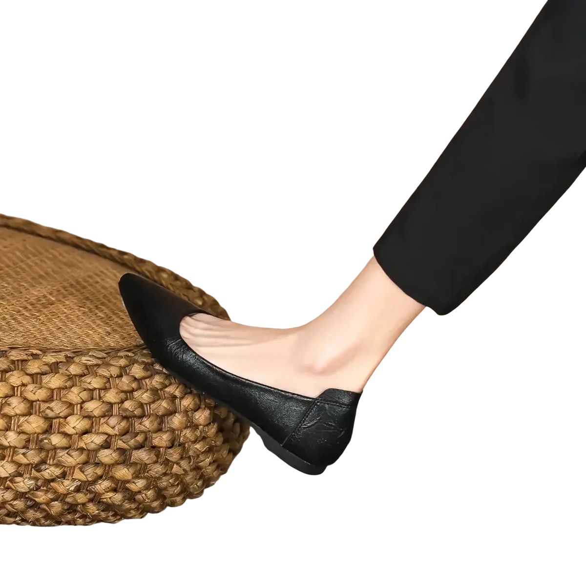 Black pointed toe leather office flats with a subtle embossed texture and a sleek black finish