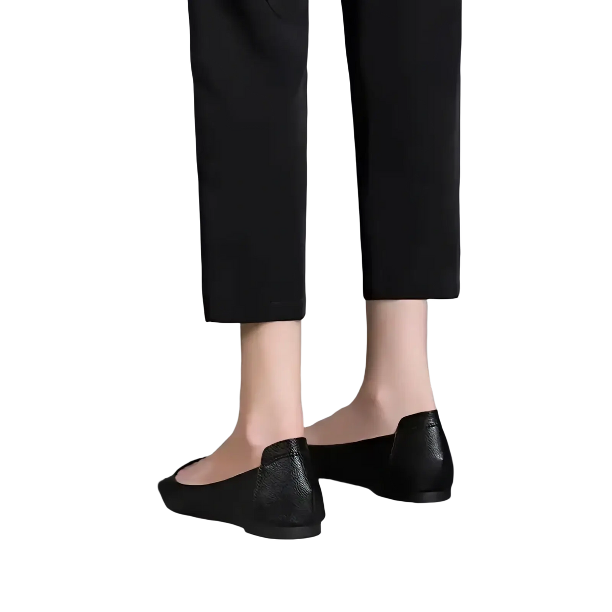 Black leather flat shoes with subtle textured finish and rounded toe design ideal for office wear