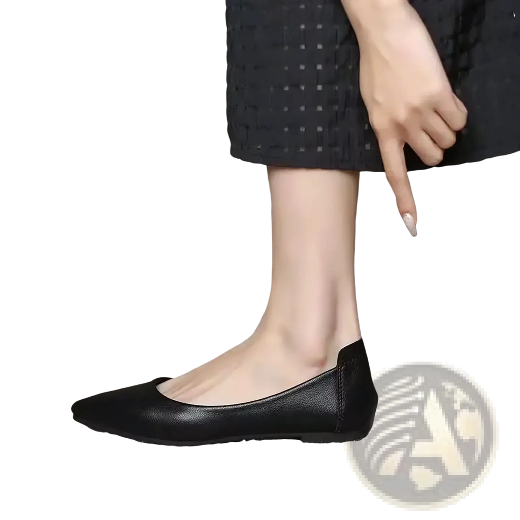 Black leather flat office shoes with pointed toe and low heel designed for professional wear