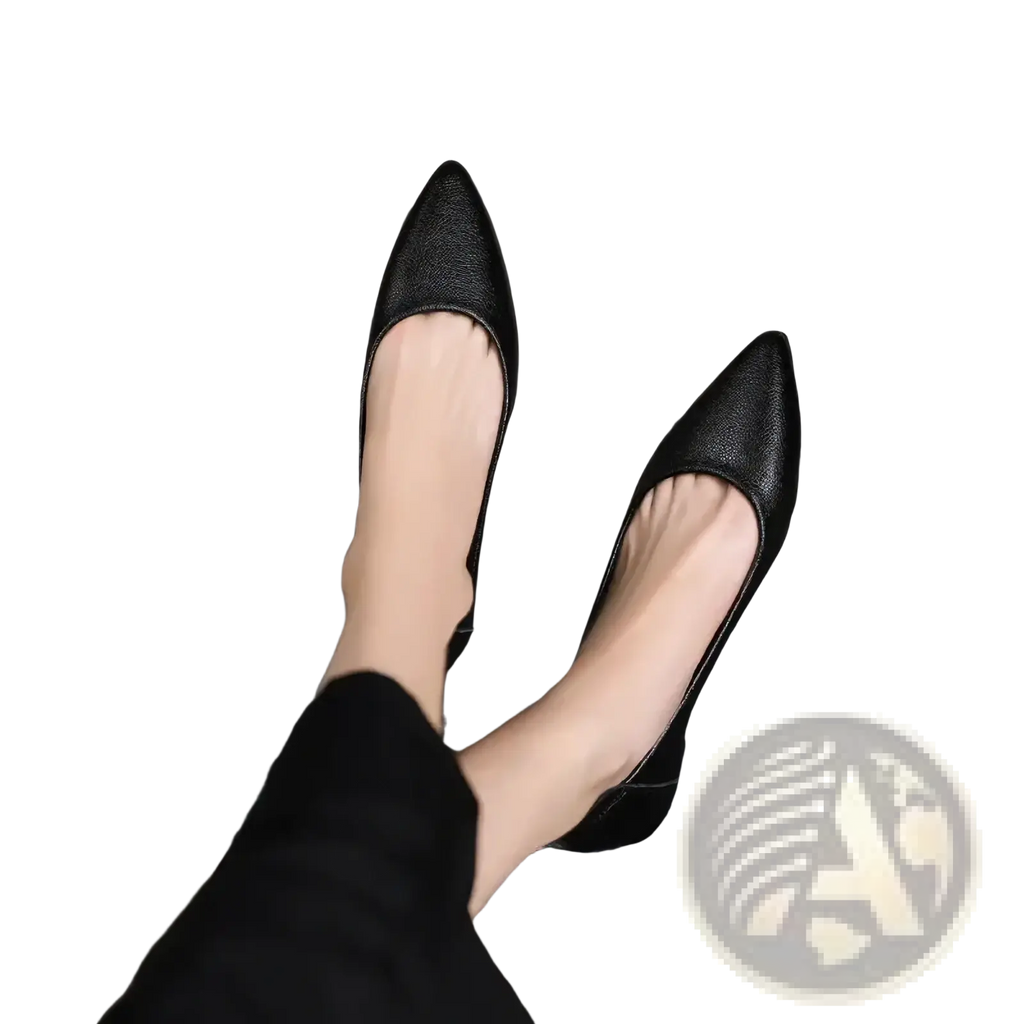 Black pointed toe leather office flats with textured upper and low heel perfect for professional wear