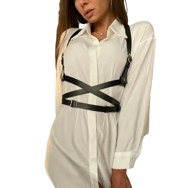 Black pu leather chest harness corset belt with adjustable straps and metal buckles worn over a white shirt