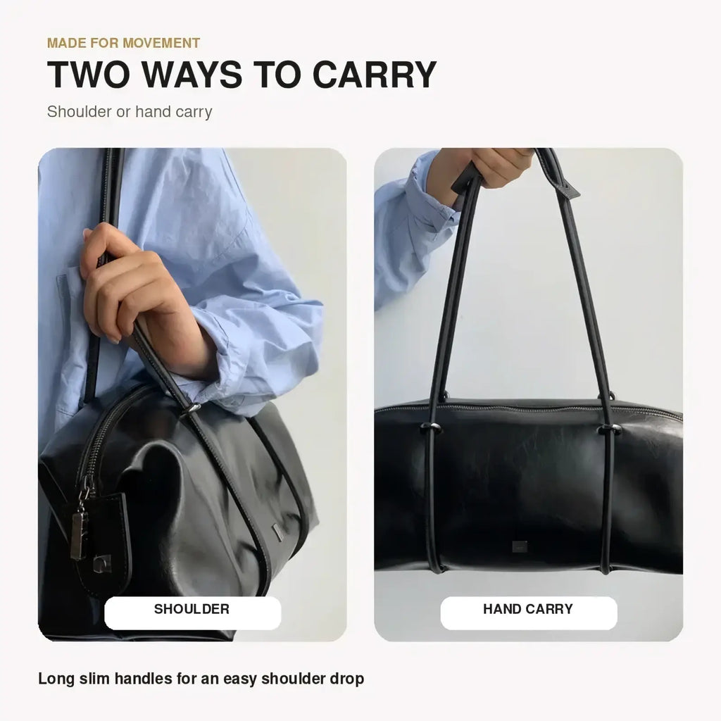 Black pu leather travel duffel bag with long slim handles for shoulder or hand carry in black leather