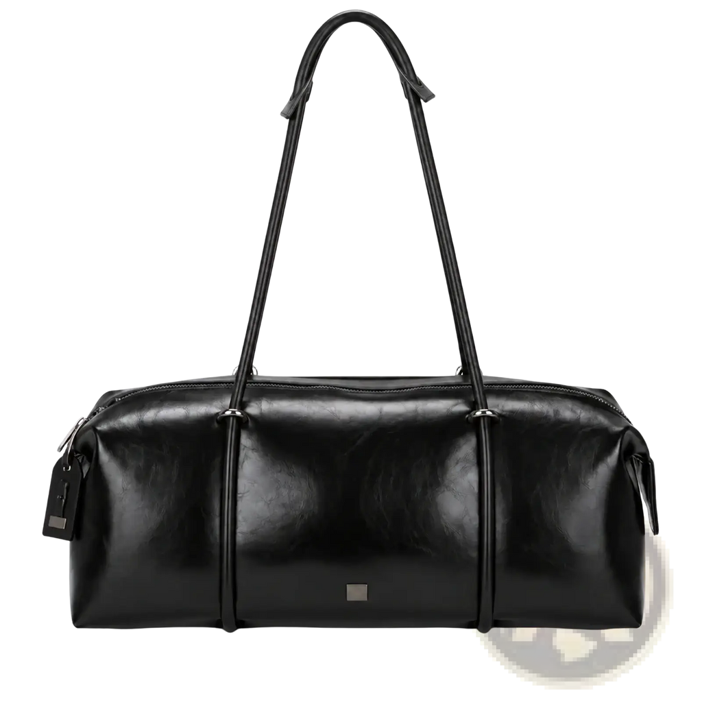 Black pu leather travel duffel bag with a sleek glossy finish and sturdy handles for gym or travel use