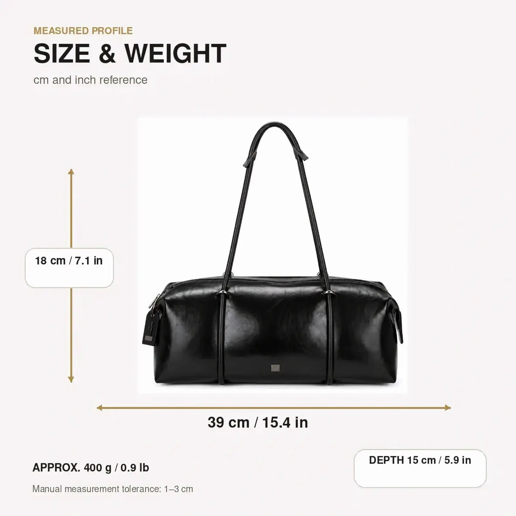 Black pu leather travel duffel bag gym tote with two top handles and a sleek minimalist design