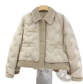 Black quilted cotton padded winter jacket with cream-colored quilted fabric and textured knit collar cuffs and front placket