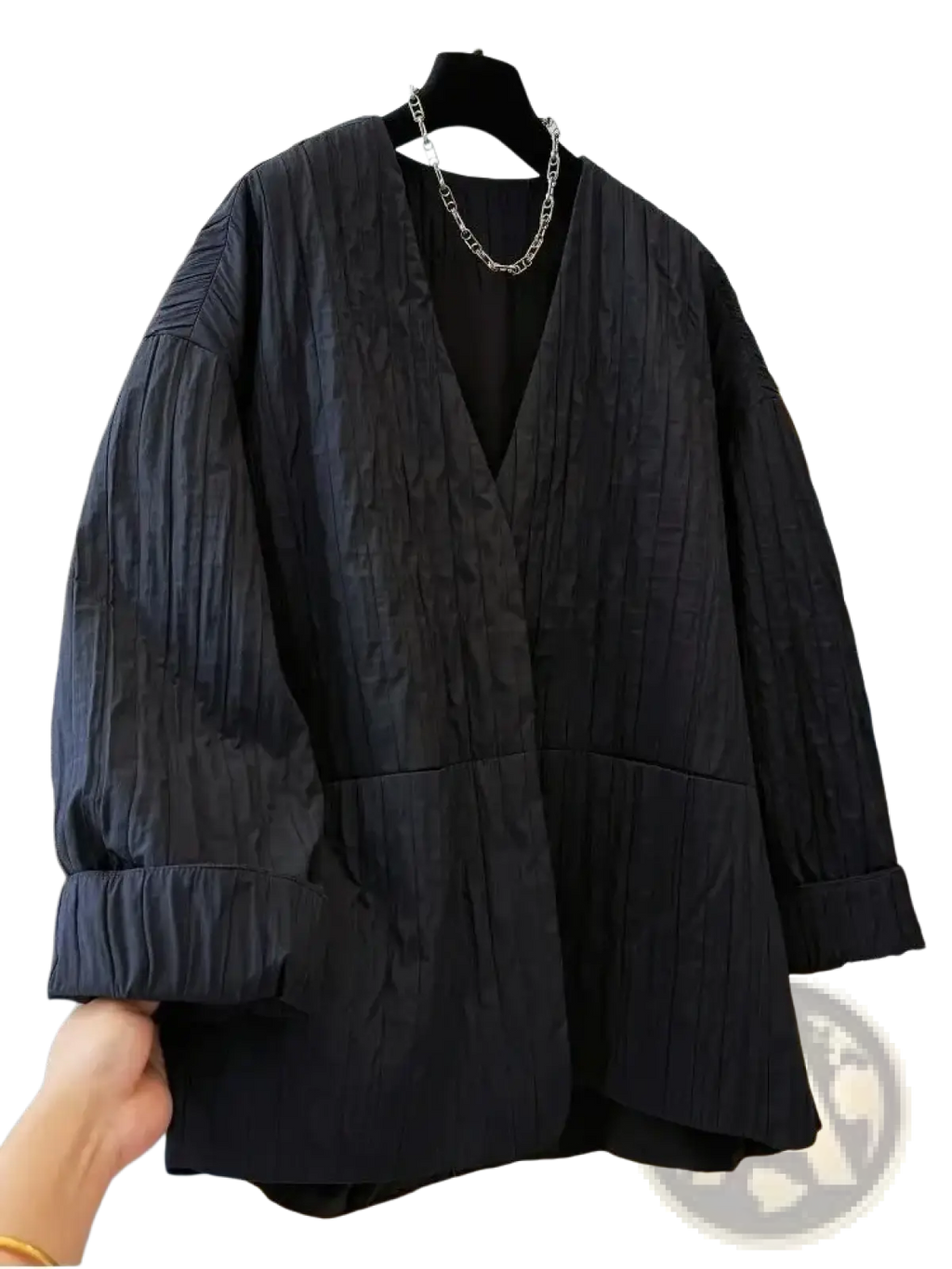 Black quilted puffer winter parka jacket with black textured blazer inspired v-neck and puffed sleeves design