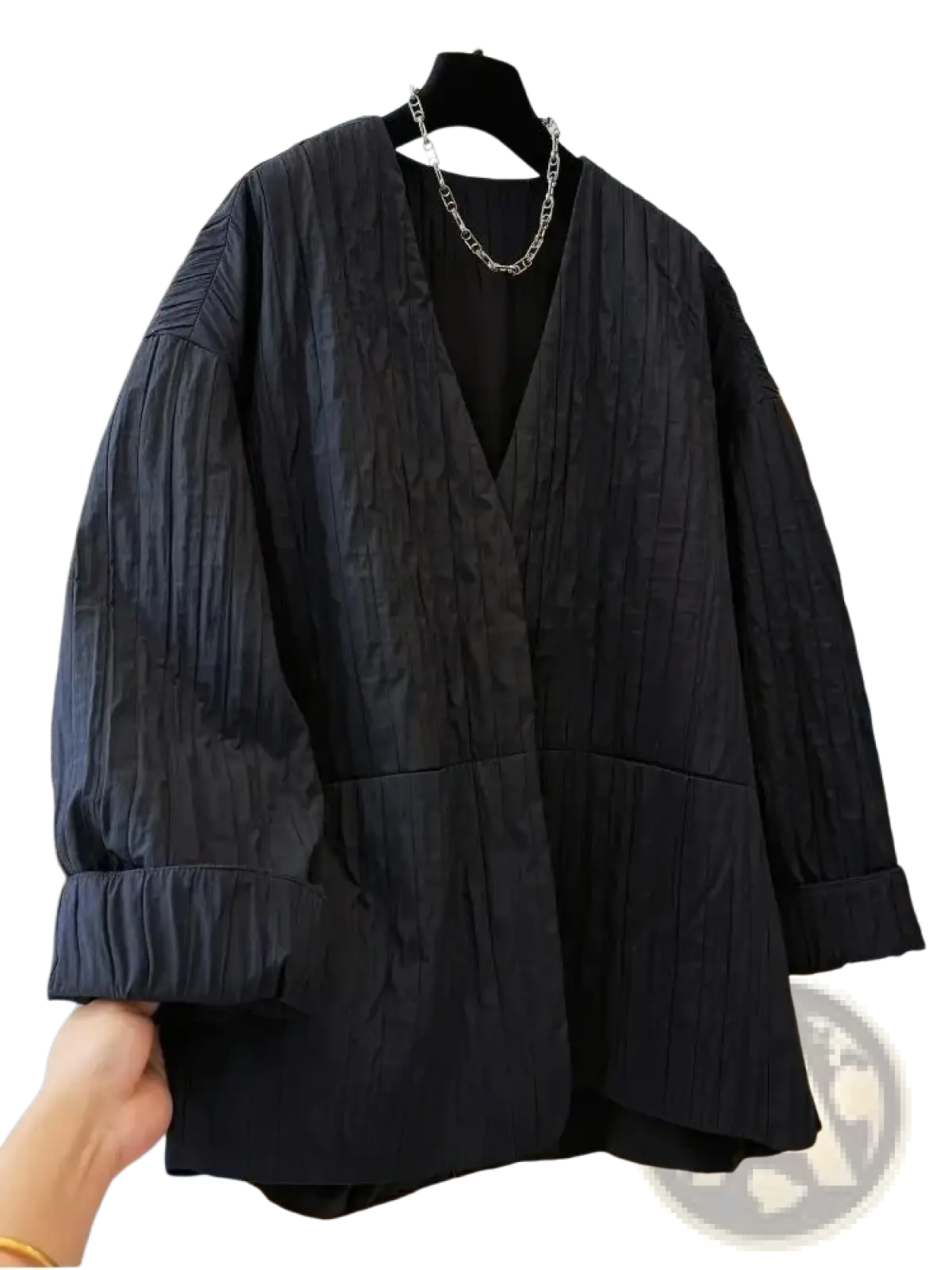 Black quilted puffer winter parka jacket with black textured blazer inspired v-neck and puffed sleeves design