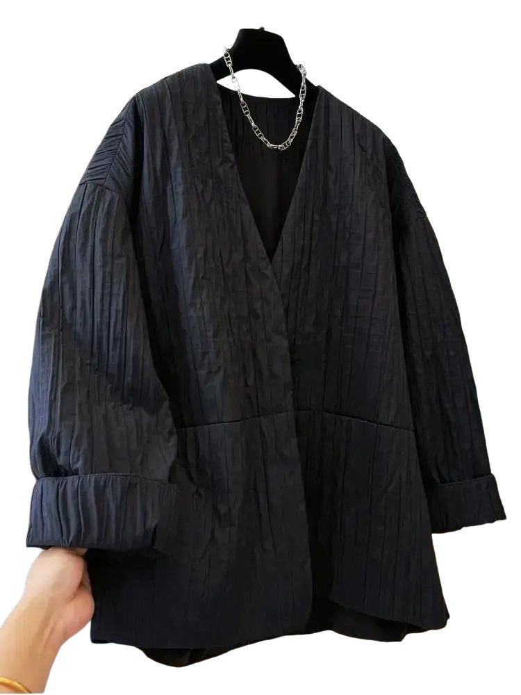 Black quilted puffer winter parka jacket with black textured blazer inspired v-neck and puffed sleeves design