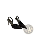 Black rhinestone slingback stiletto heels with sparkling embellishments and a gold-toned circular buckle on the strap