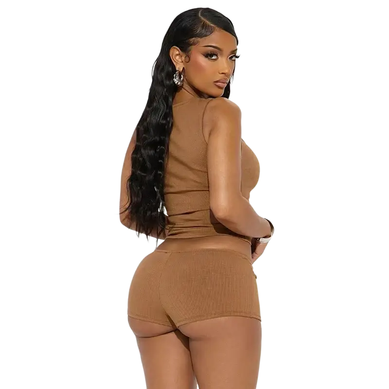 A form-fitting ribbed tan two-piece knit set featuring a high-neck top and matching shorts with cut-out details