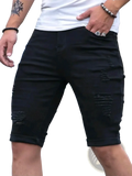 Black ripped denim shorts for men featuring distressed black denim with rolled cuffs