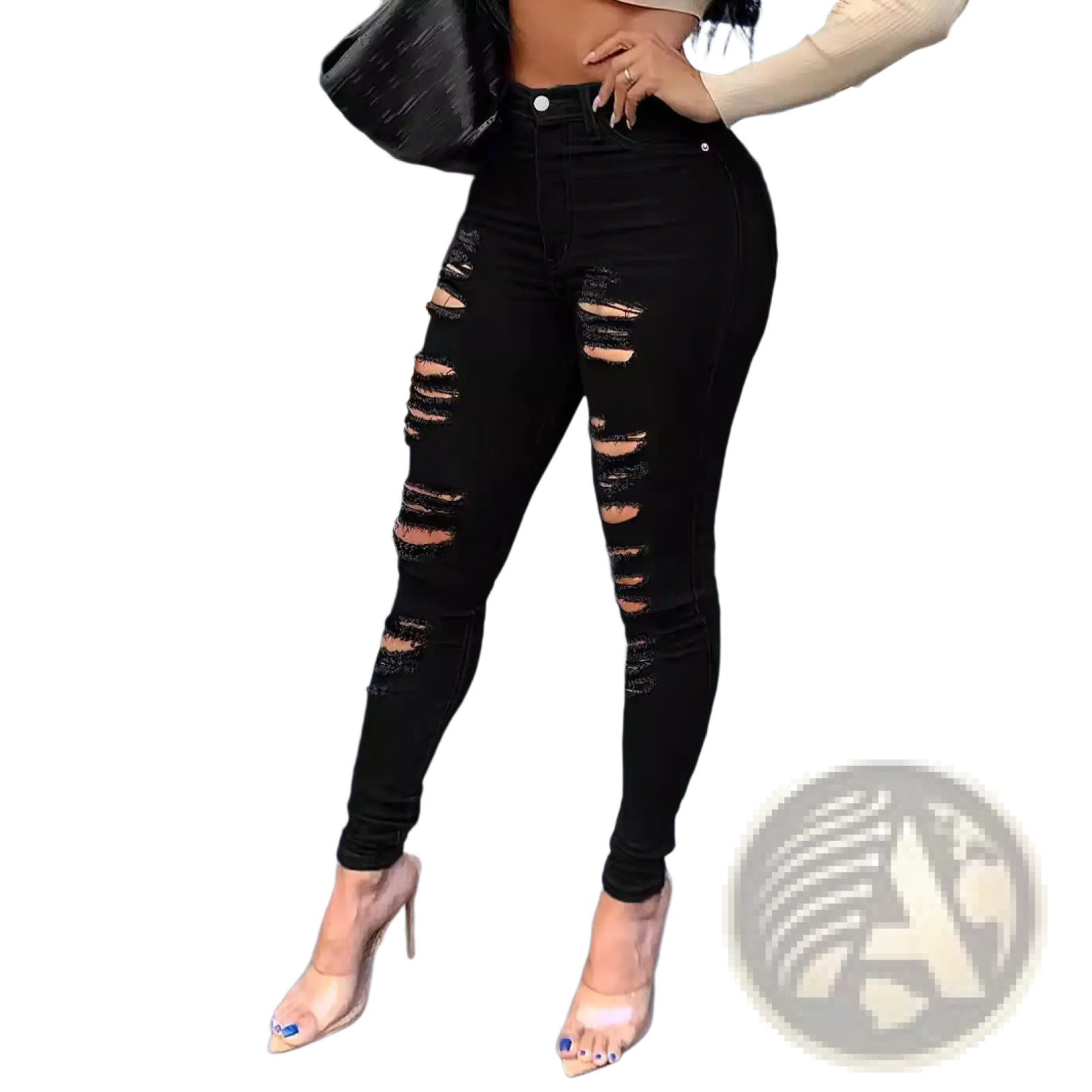 Black ripped high waisted skinny jeans featuring distressed patches and a classic five pocket design