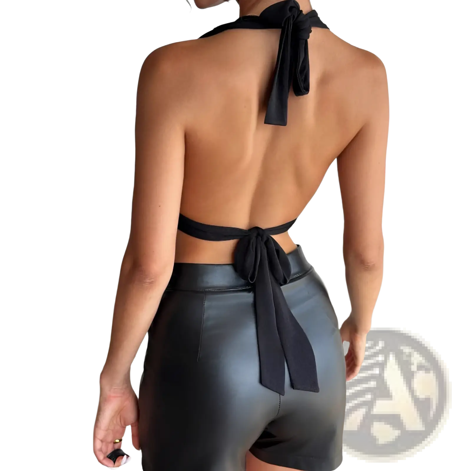 Black satin halter romper featuring a tie-back top and faux leather shorts shown from the back side