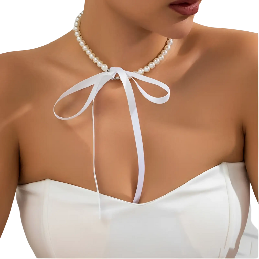 Black satin and pearl ribbon choker jewelry set featuring a delicate white pearl necklace with a satin bow front