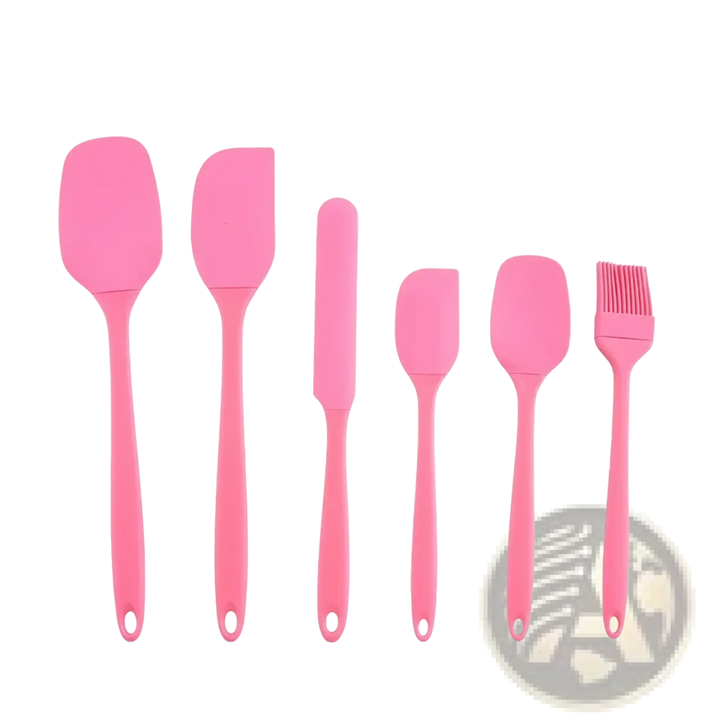 Set of six pink silicone kitchen utensils including spatulas knife and brush for baking and cooking tasks