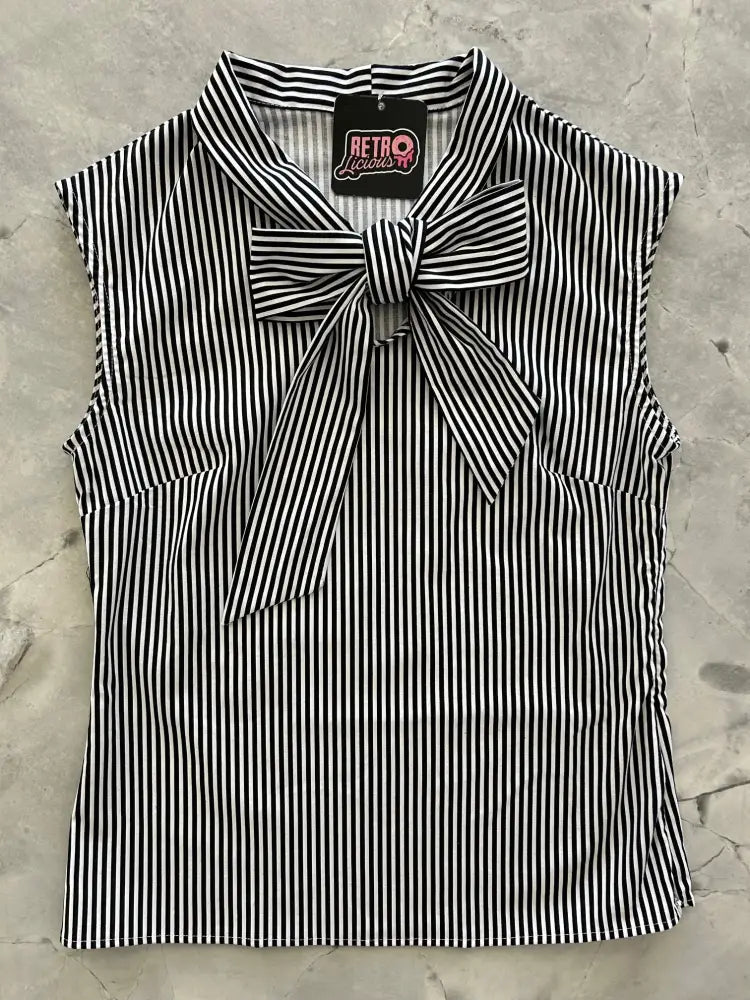 Vintage 1950s black and white striped sleeveless cotton blouse with a prominent bow at the neckline