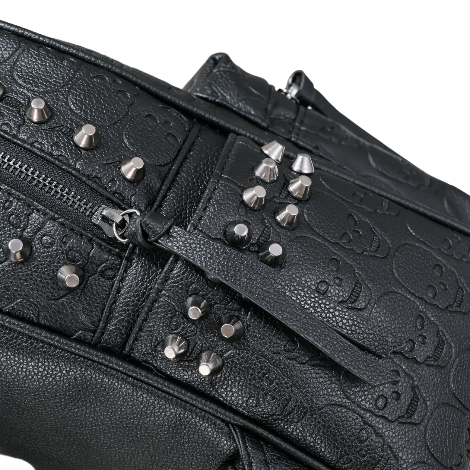 Black studded skull leather commute backpack featuring embossed skull pattern and silver-toned studs crossbody bag