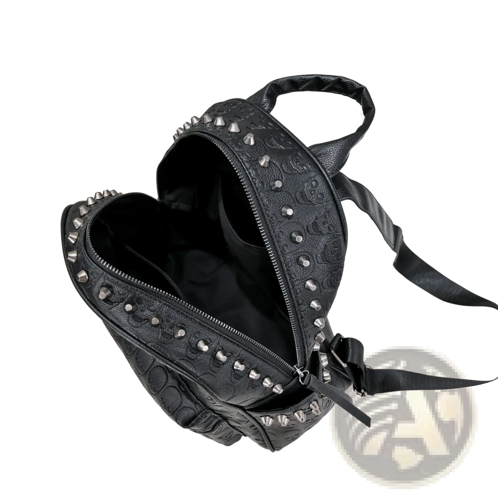 Black studded skull leather commute backpack with embossed skull pattern and leather straps shown from the back side