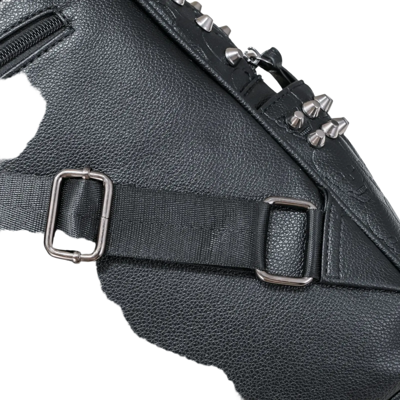 Black studded skull leather commute backpack in black textured leather with silver metal studs and buckle straps