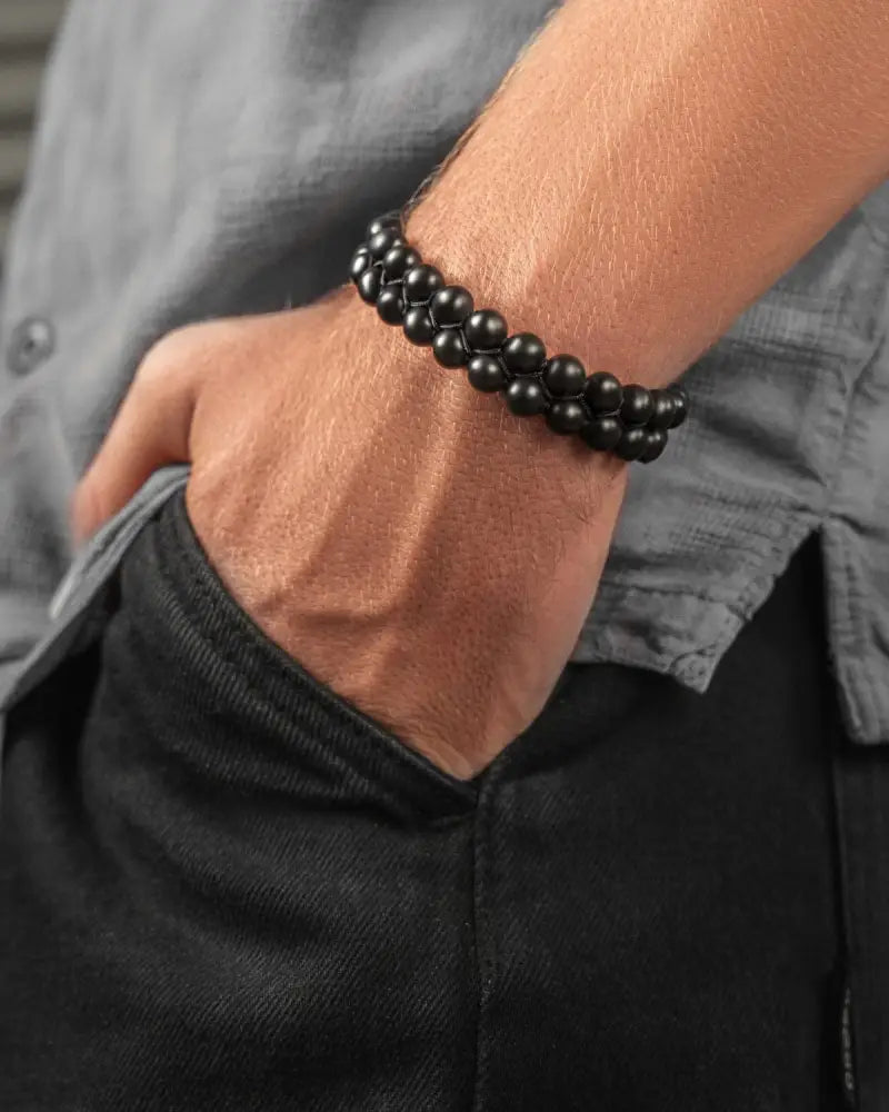 Aaa grade black tourmaline double strand beaded bracelet with smooth round black spheres in a double-strand pattern