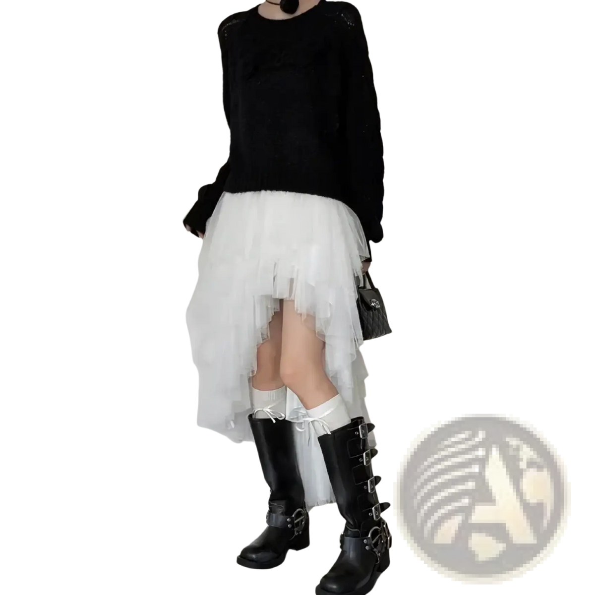 Black leather knee-high boots with silver buckles paired with a black tutu party dress with asymmetric knit top