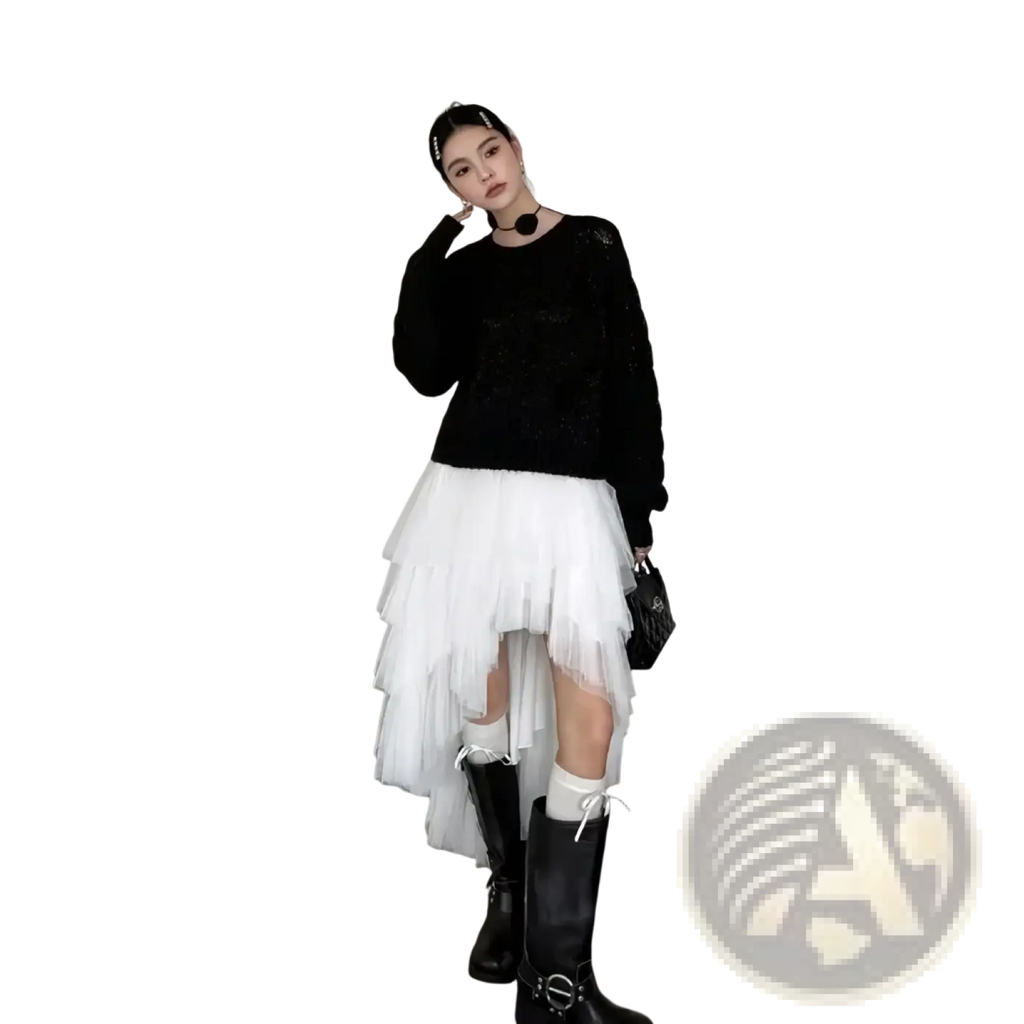 Black tutu party dress featuring a black textured knit long sleeve top with a round neckline and asymmetric design