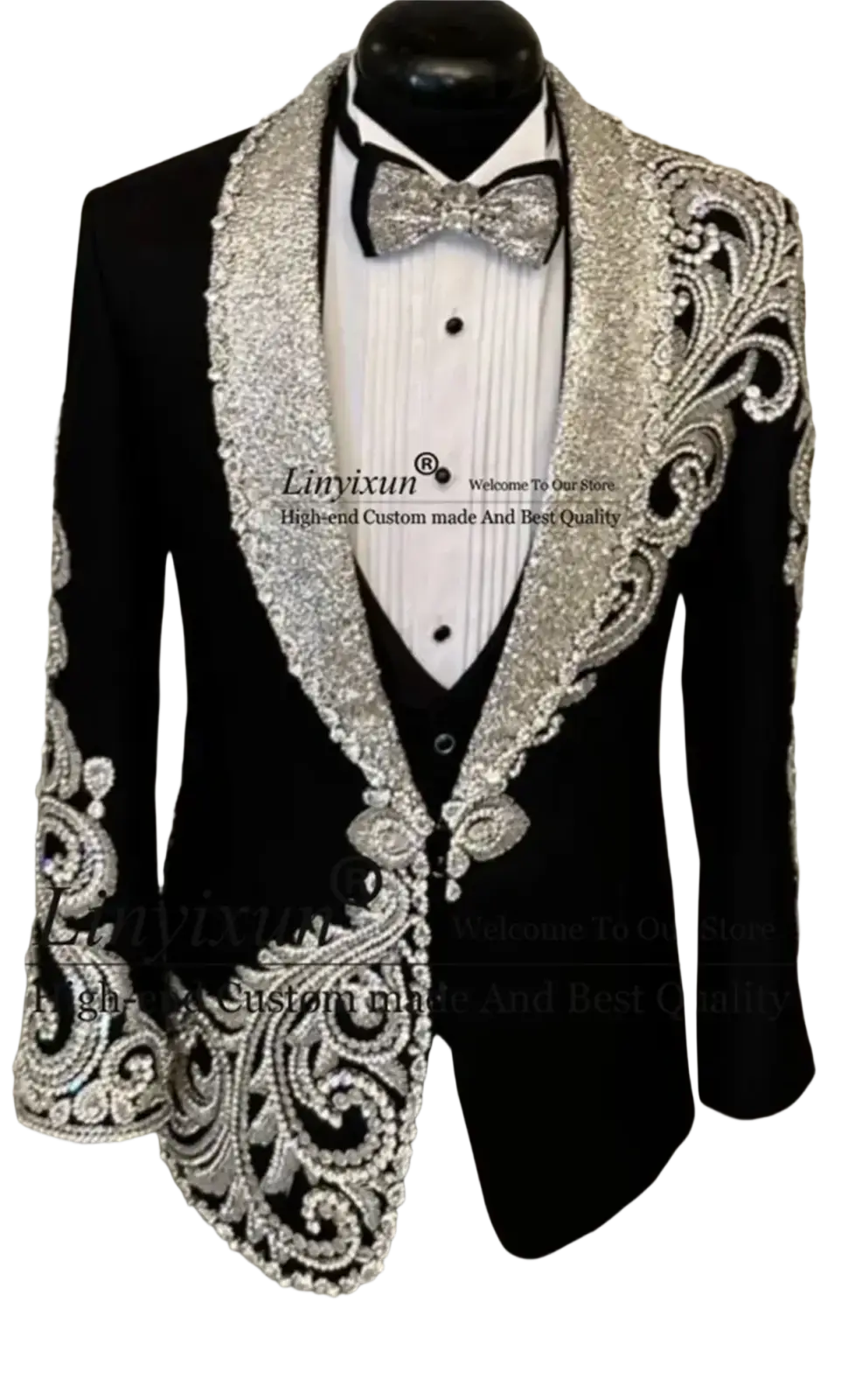 Black velvet men wedding tuxedo suit with intricate silver beaded embroidery on lapels shoulders and cuffs
